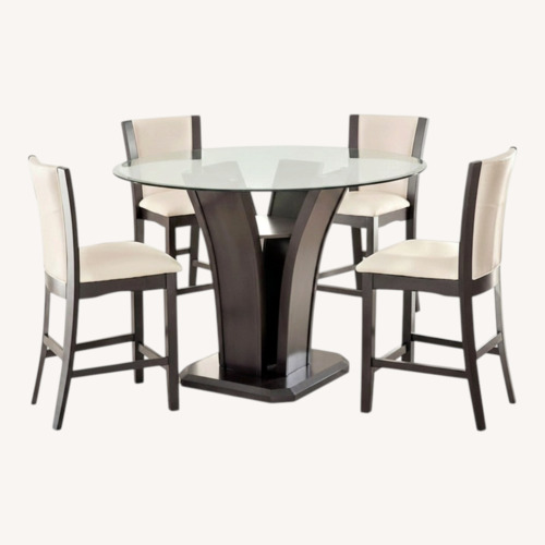 Used Round Dining Table with Chairs for sale on AptDeco