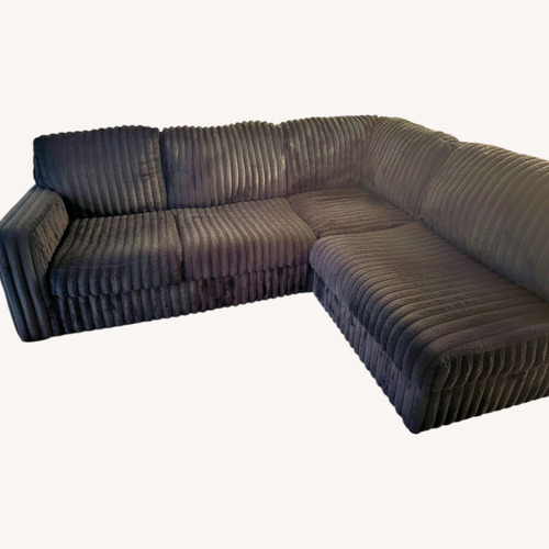 Used Ashley Furniture Black 3+ Piece Sectional for sale on AptDeco