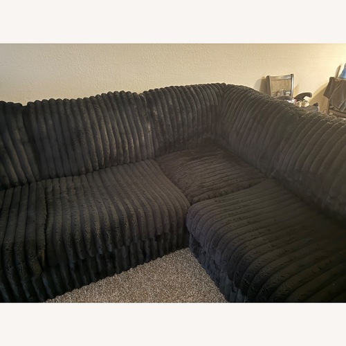 Used Ashley Furniture Black 3+ Piece Sectional for sale on AptDeco
