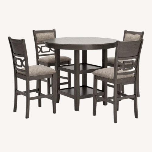 Used Ashley Furniture Dark Gray Wood Dining Table for sale on AptDeco