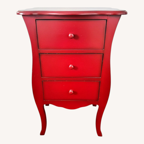 Used Quirky Red Wood Nightstand for sale on AptDeco