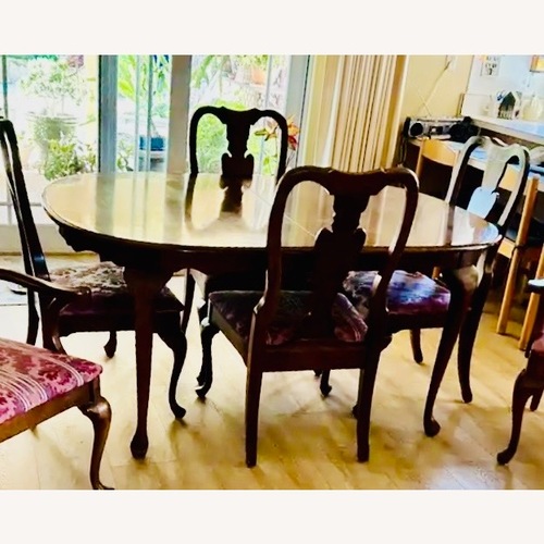 Used Thomasville Oval Cherry Wood Dining Set for sale on AptDeco