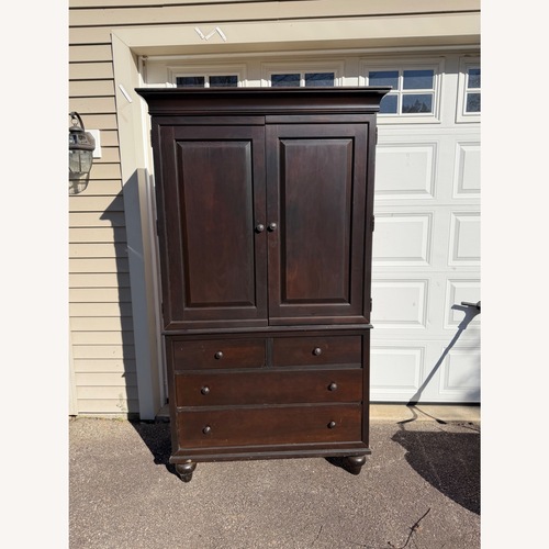 Used Kincaid Furniture Dark Brown Wood Armoire for sale on AptDeco