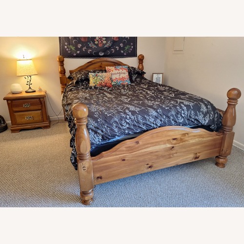 Used Bassett Natural Wood Queen Bed for sale on AptDeco