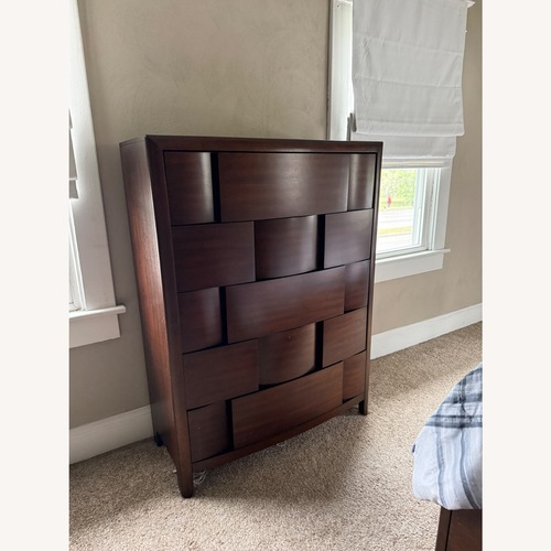 Used Rooms To Go Dark Brown Wood Dresser for sale on AptDeco