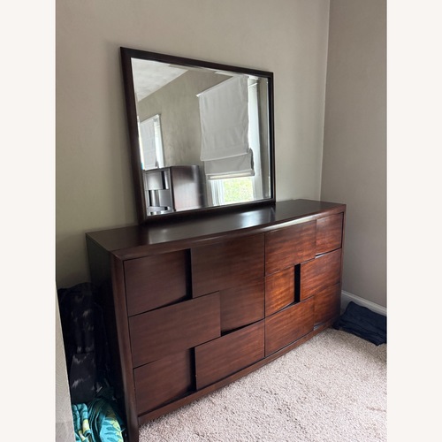 Used Rooms To Go Dark Brown Wood Dresser for sale on AptDeco