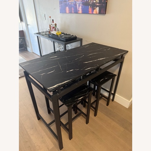 Used Light Gray Wood Dining Set for sale on AptDeco