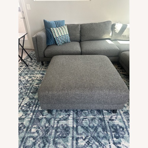 Used Room & Board Dark Gray Sectional and Ottoman for sale on AptDeco