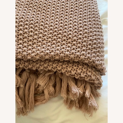 Used Pink Cotton Throw for sale on AptDeco