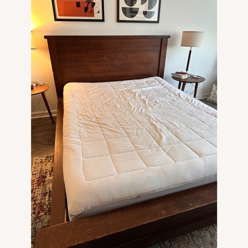 Used Pottery Barn Sumatra Queen Platform Bed for sale on AptDeco