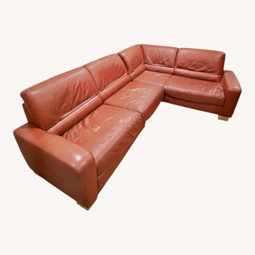 Used Macy's Orange Leather 2 Piece Sectional for sale on AptDeco