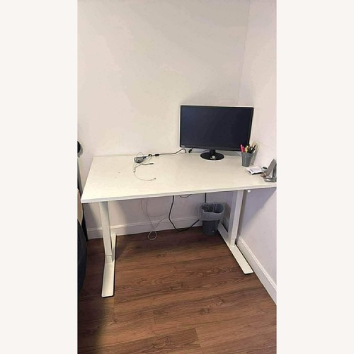 Used IKEA Trotten White Wood Desk for sale on AptDeco