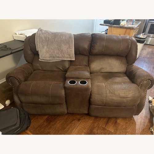 Used Dark Brown Leather Loveseat for sale on AptDeco