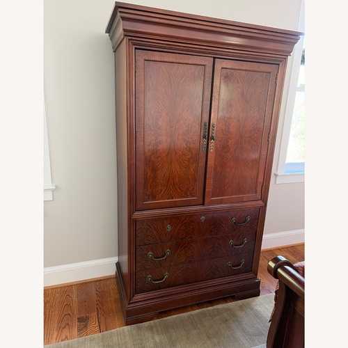 Used Drexel Studios Dark Brown Wood Armoire for sale on AptDeco