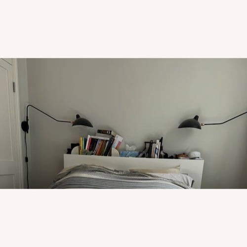 Used Article Leap Black Metal Wall Lamp for sale on AptDeco