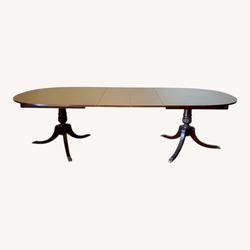 Used Vintage/Antique Dark Brown Wood Dining Table for sale on AptDeco