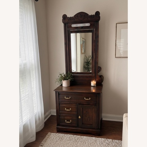 Used Vintage/Antique Dark Brown Wood Dresser for sale on AptDeco