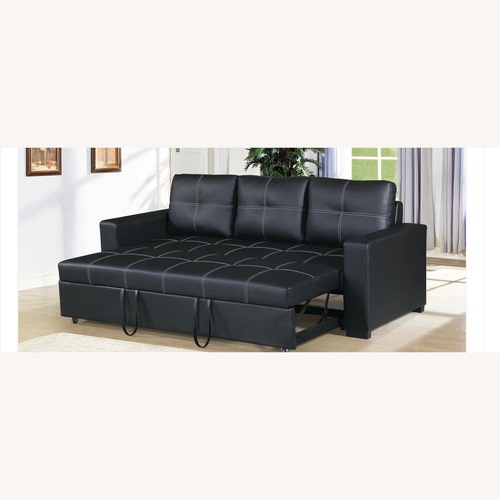 Used Julian Appelius Black Faux Leather Sleeper Sofa for sale on AptDeco