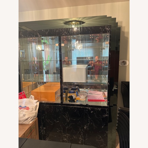Used Black China Closet for sale on AptDeco