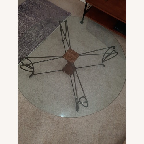 Used Glass Top with Iron/Wicker Base Coffee Table for sale on AptDeco