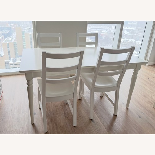 Used IKEA ROSENTORP White Wood Dining Set + 6 Chairs for sale on AptDeco