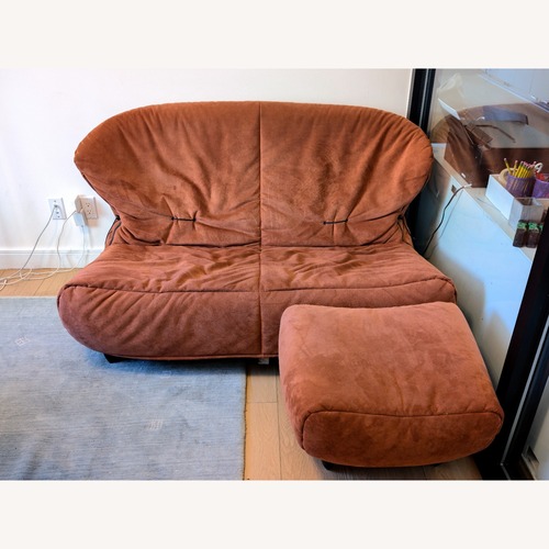 Used Ligne Roset Orange Suede Loveseat for sale on AptDeco