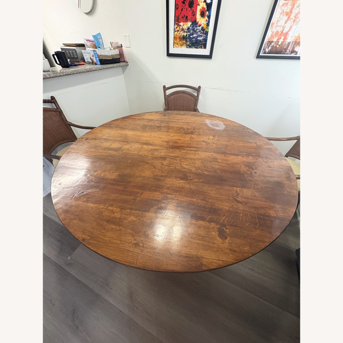 Used Dark Brown Wood Dining Table for sale on AptDeco