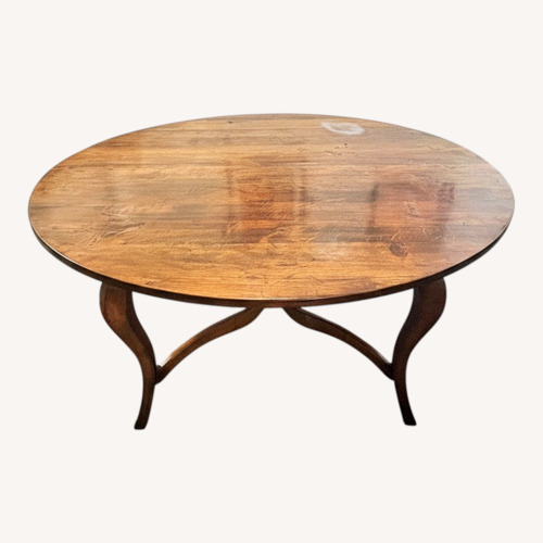 Used Dark Brown Wood Dining Table for sale on AptDeco