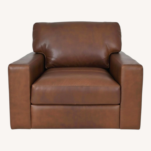 Used Dark Brown Leather Swivel Armchair for sale on AptDeco
