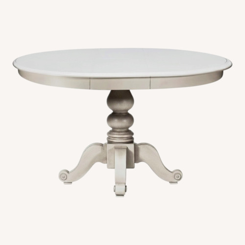 Used Jordan’s Furniture Summer House Round Table for sale on AptDeco
