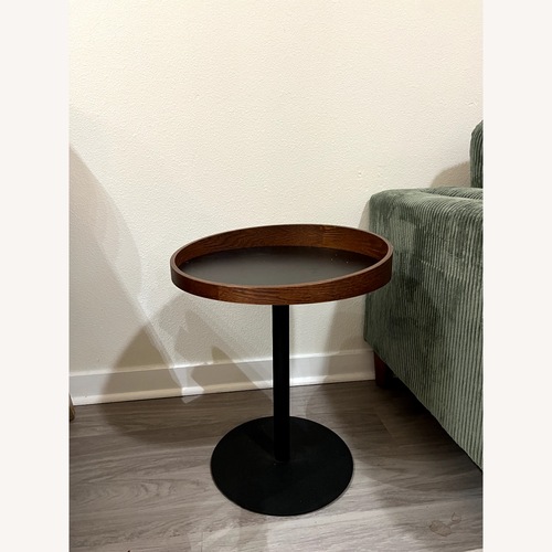 Used Crater Dark Brown Wood Coffee Table for sale on AptDeco