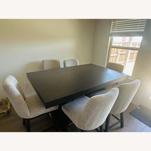 Used Millenium Burkhaus Counter Table and 6 Stools for sale on AptDeco
