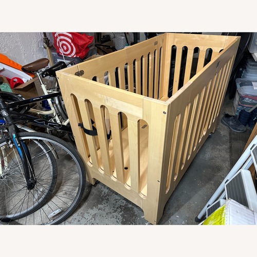 Used Bloom Alma Papa Folding Crib  for sale on AptDeco