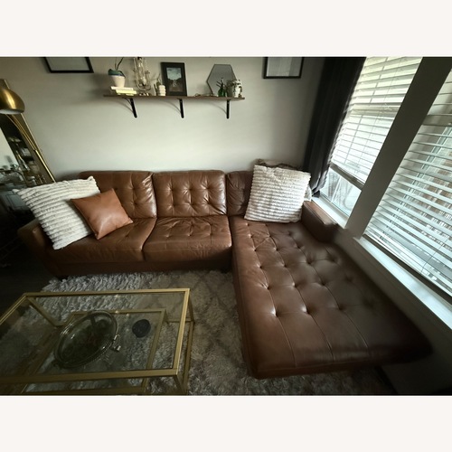 Used Ashley Baskove Brown 2-Piece Sectional with Chaise for sale on AptDeco