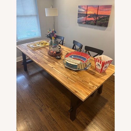 Used IKEA Skogsta Natural Wood Dining Table for sale on AptDeco