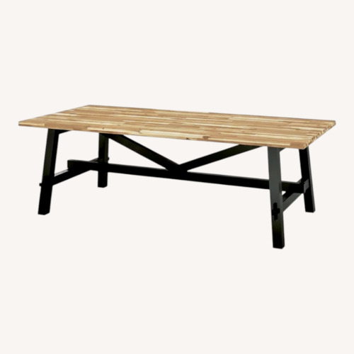 Used IKEA Skogsta Natural Wood Dining Table for sale on AptDeco