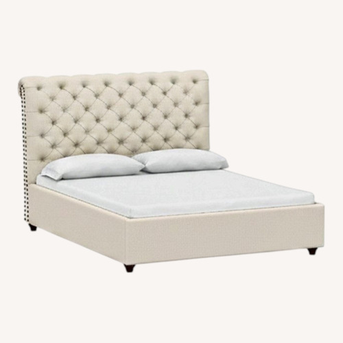 Used Pottery Barn Chesterfield Ivory Fabric Queen Bed for sale on AptDeco