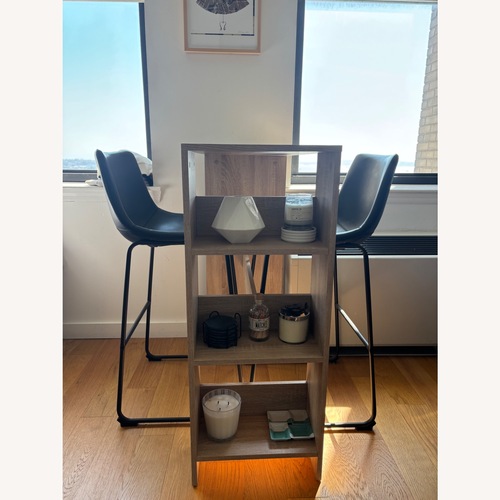Used Black Faux Leather Bar Stools for sale on AptDeco