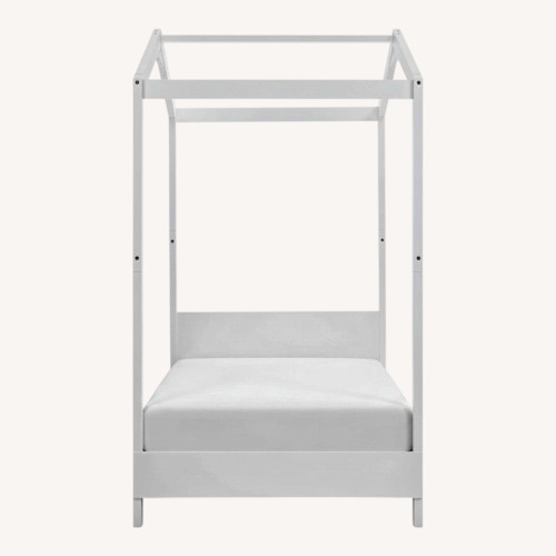 Used Canopy Twin Bed  for sale on AptDeco