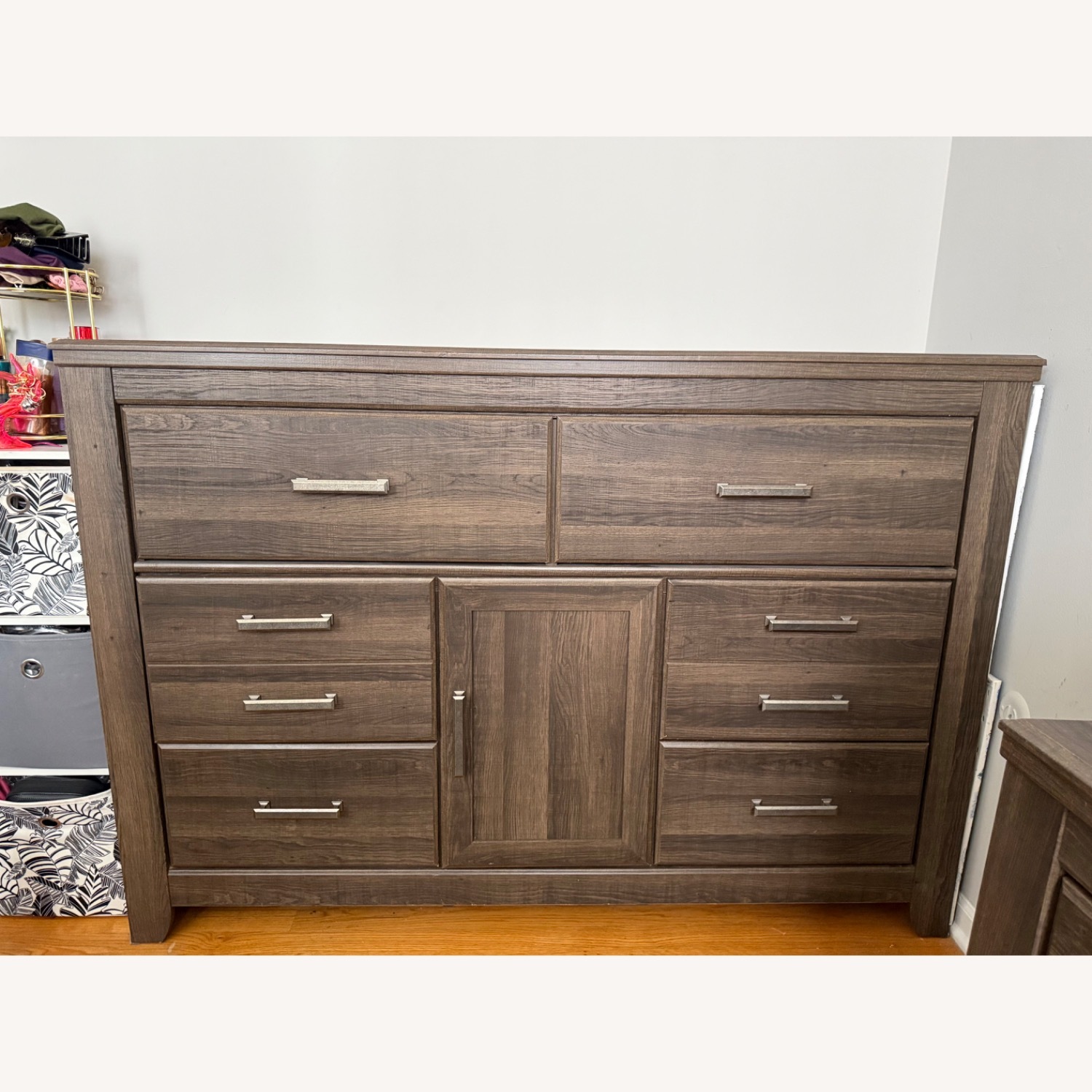 Ashley Furniture Juararo Dark Brown Wood Dresser - image-1