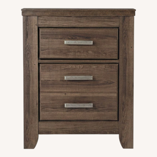 Used Ashley Furniture Juararo Dark Brown Wood Nightstand for sale on AptDeco
