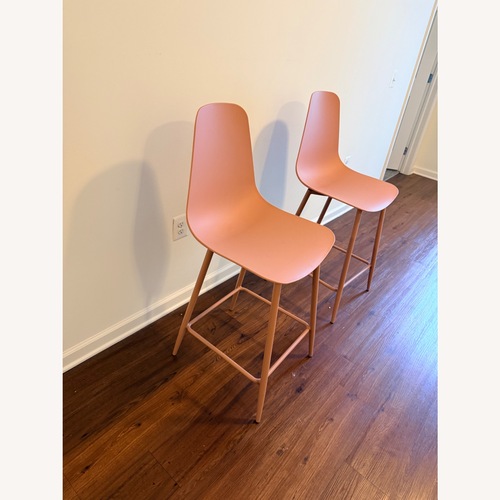 Used Article Svelti Dusty Rose Counter Stools for sale on AptDeco