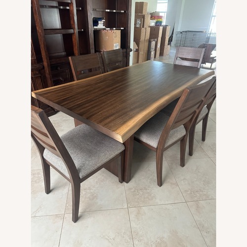 Used Dining Table with 6 Chairs for sale on AptDeco