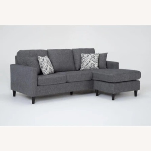 Used Living Spaces Mathers Slate Grey Fabric 91" Sofa with Reversible Chaise for sale on AptDeco