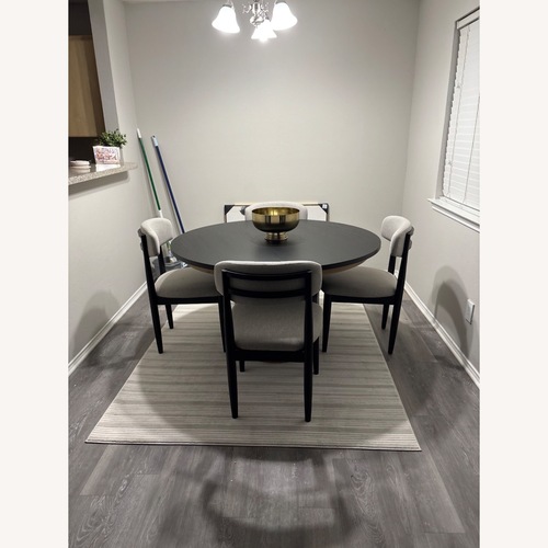 Used Magnolia Black Wood Dining Set for sale on AptDeco