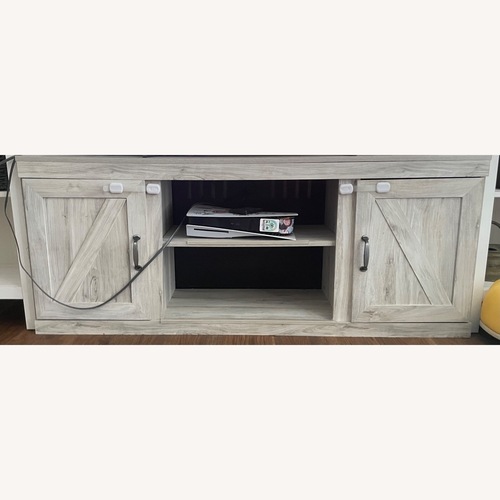 Used Ashley Furniture Bellaby 60” Tv Stand Wall Shelf for sale on AptDeco