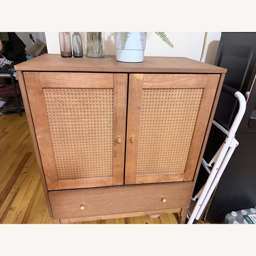 Used Mid-Century Modern Wood and Rattan Sideboard for sale on AptDeco