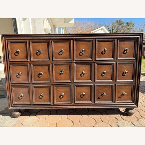 Used Solid Wood Dark Brown 7-Drawer Dresser for sale on AptDeco