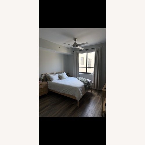 Used IKEA Bjorksnas Natural Wood Queen Bed for sale on AptDeco