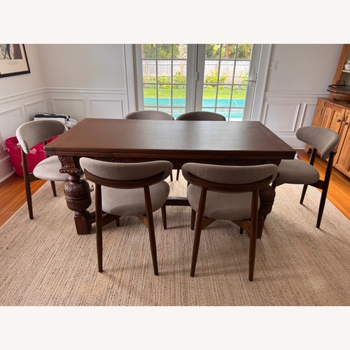 Used Antique Dark Brown Dining Table for sale on AptDeco